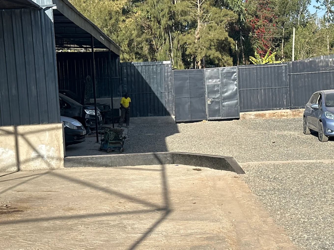 Technician at work inside the Pro-Wealth Automotive Garage workshop